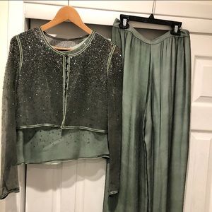 Three piece suit. Sweater pants and shirt